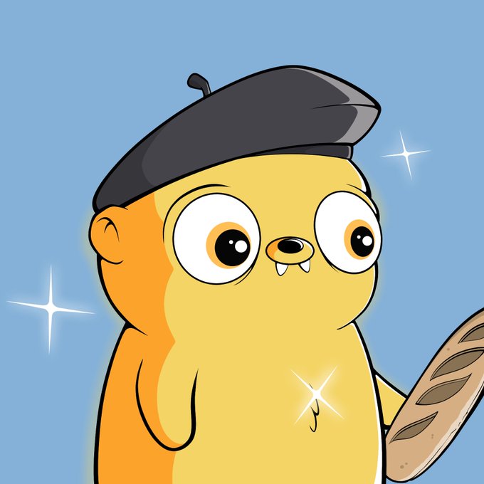 A cartoon illustration of a yellow, round creature wearing a black beret and holding a loaf of bread, with sparkling stars in the background.