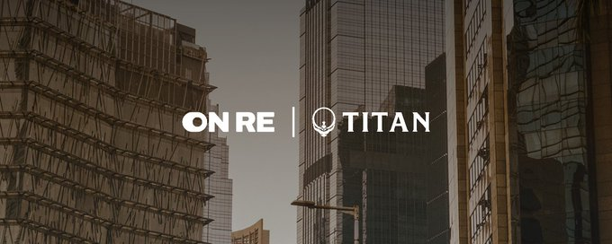A cityscape of tall skyscrapers with the text 'ONRE | TITAN' overlaid in white.