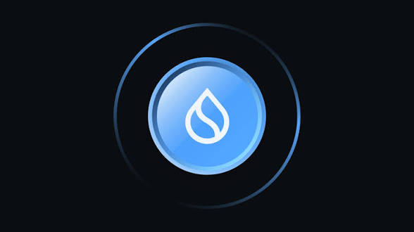A SUI cryptocurrency logo displayed as a blue circular emblem with a stylized water drop symbol on a dark background.