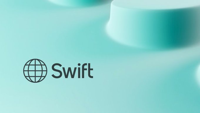 The image features a close-up view of a blue globe logo with the words "Swift" written below it, indicating that Swift is being promoted as a new payment method for global banking institutions. The text also mentions that this new payment method will be available in January and that there are already 25+ banks involved in processing payments using Swift.