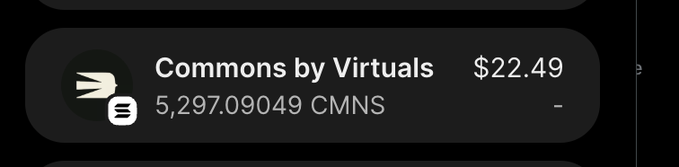 A dark UI element showing a wallet entry for 'Commons by Virtuals' with a balance of 5,297.09049 CMNS valued at $22.49.
