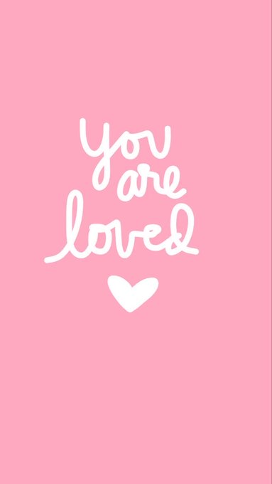 A simple pink graphic with white hand-lettered text reading 'You are loved' above a small white heart.