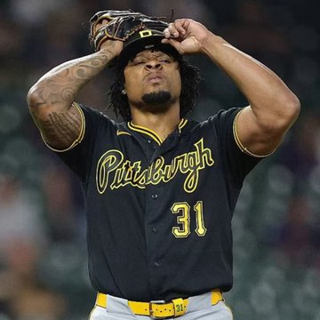 A Pittsburgh Pirates player wearing jersey number 31 stands on the mound with his glove raised above his head, looking up toward the sky. The image appears to accompany a post about a large $30,000 wager placed on a Pirates game, visually representing the team at the center of the high-stakes bet.