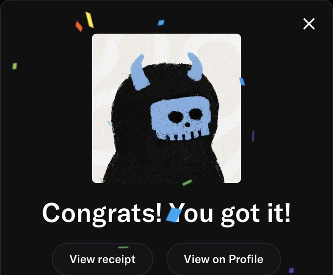 A digital interface shows a congratulatory message 'Congrats! You got it!' alongside an icon of a black hooded figure with blue horns and a blue skull face.