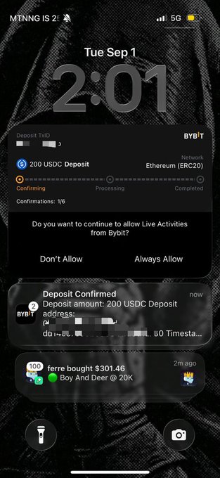 The image shows an iPhone Lock Screen displaying a Bybit notification confirming a "200 USDC Deposit" on the Ethereum (ERC20) network with 1/6 confirmations, along with a prompt asking to allow Live Activities from Bybit. The post references getting paid via Bybit, and the image supports this by showing an incoming 200 USDC deposit notification on the Ethereum network.