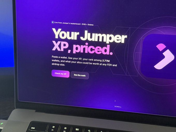 A laptop screen displays the Jumper cryptocurrency platform's "Your Jumper XP, priced" page, featuring the tagline "Live from Jumper's leaderboard • EVM + Solana" and inviting users to paste a wallet to check their XP ranking among 2.77M wallets. The image relates to the post by teasing a playful, informal preview of the Jumper platform ahead of a launch.