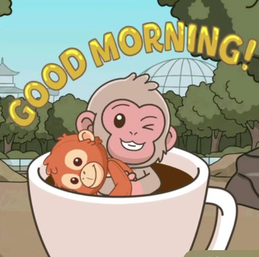 A cartoon graphic showing two monkeys in a coffee cup with the text 'GOOD MORNING!' against a park background.