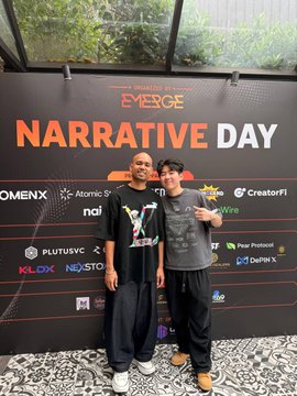 Two attendees pose together at Malaysia Blockchain Week's "Narrative Day" event, standing in front of a sponsor backdrop featuring logos from companies like Omens, Atomic, ndi, PlutusVC, KILOX, NOS, Peg Protocol, GemFi, and Wire. The event marks the official kickstart of Malaysia Blockchain Week, with the two young men representing the community's enthusiastic participation in the blockchain industry gathering.