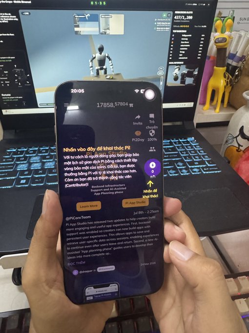 A person holds a smartphone displaying a Pi app interface in Vietnamese with '17958.57804 π' balance, showing Pi App Studio and a prompt to tap to start mining.