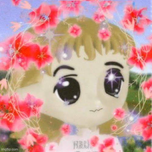 An animated, stylized illustration of a character with large sparkling eyes surrounded by pink flowers.