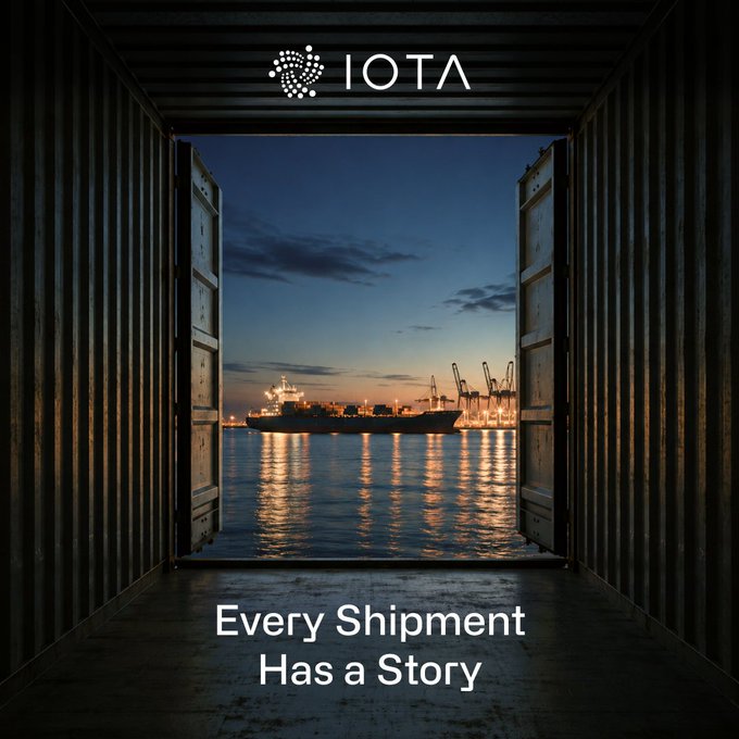 An IOTA promotional image with the tagline 'Every Shipment Has a Story,' showing a view through an open shipping container of a port at dusk with cranes and a cargo ship.