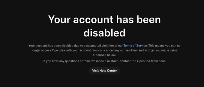A dark screen displaying the message 'Your account has been disabled' in white text, indicating an OpenSea account suspension due to a suspected Terms of Service violation.