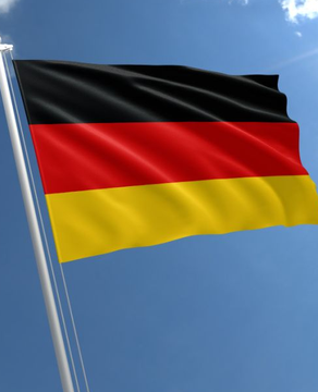 The image shows the German flag waving against a blue sky. It ties to the post as a visual representation of Germany, the country that sold its Bitcoin holdings at a loss, missing out on €650 million in potential gains.