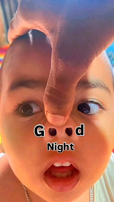 A close-up of a person's face as another person's fingers pinch their nose, with overlaid text reading 'Good Night'.