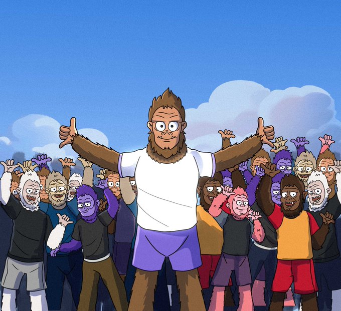 A cartoon illustration shows a bearded man in a white t-shirt and purple shorts standing triumphantly with arms outstretched, surrounded by a crowd of cheering characters, including purple and white monkeys, against a blue sky background.