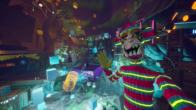 A 3D rendered monkey character in a striped clown costume waving, set in a colorful, surreal urban environment with floating cubes.
