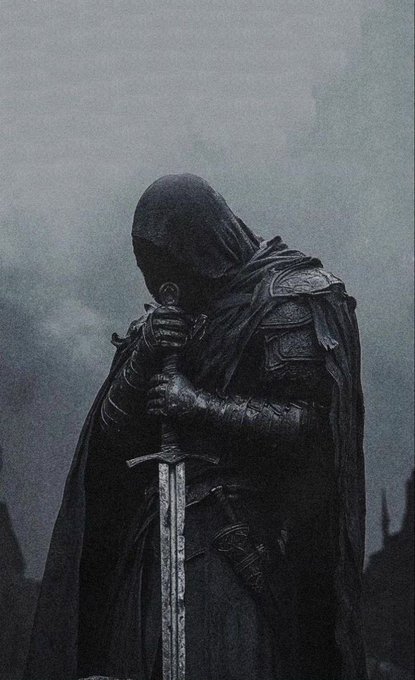 A hooded, armored figure in dark clothing holds a large sword, shrouded in a misty, somber atmosphere.