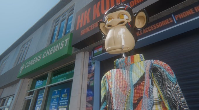 A mannequin monkey in a vibrant patchwork shirt and gold teeth stands on a street in front of "HK K" supermarket and "Cohens Chemist," with text visible for "Mobile Accessories" and "Prescription Delivery Service." The quirky storefront scene captures the offbeat, street-hustle vibe referenced in the caption about posing for cash.