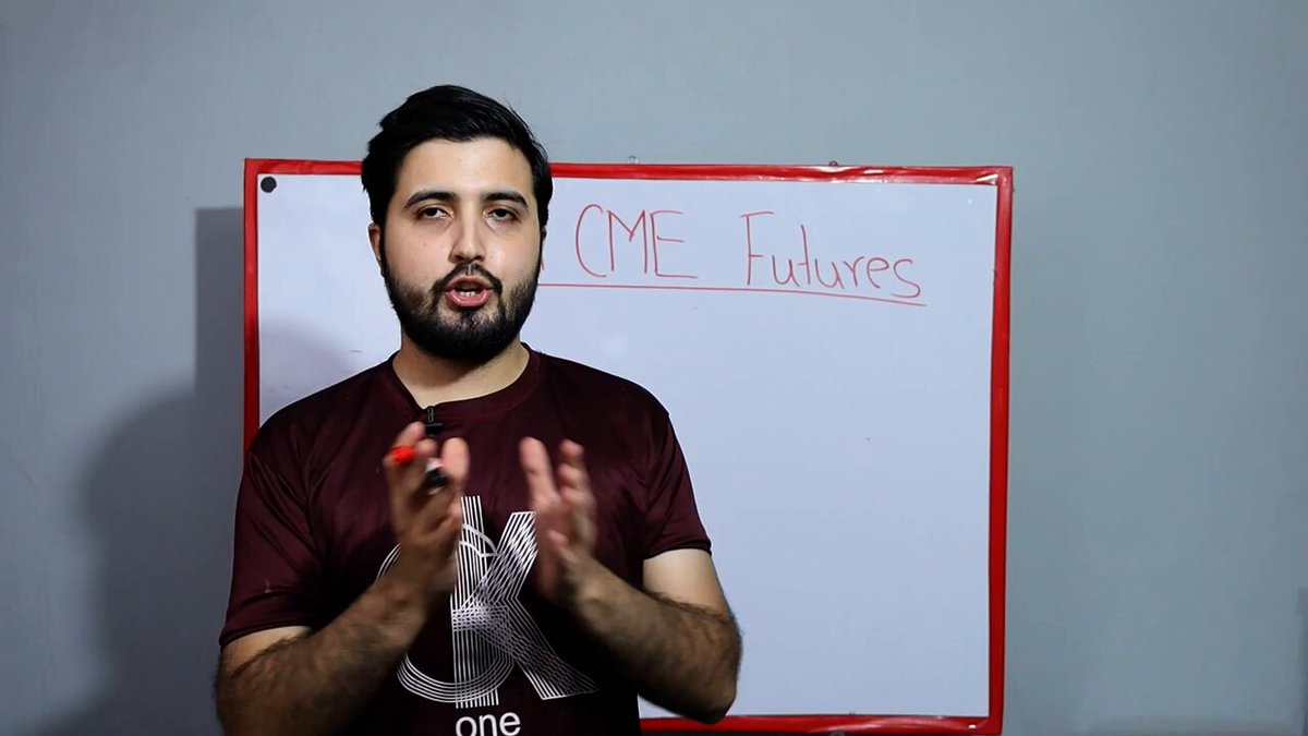 The image features a man wearing a maroon shirt, standing against a white background with his hands clapping together. The text "CME Fails" is written above him, indicating that he might be discussing or reviewing the failures of Cardano cryptocurrency.