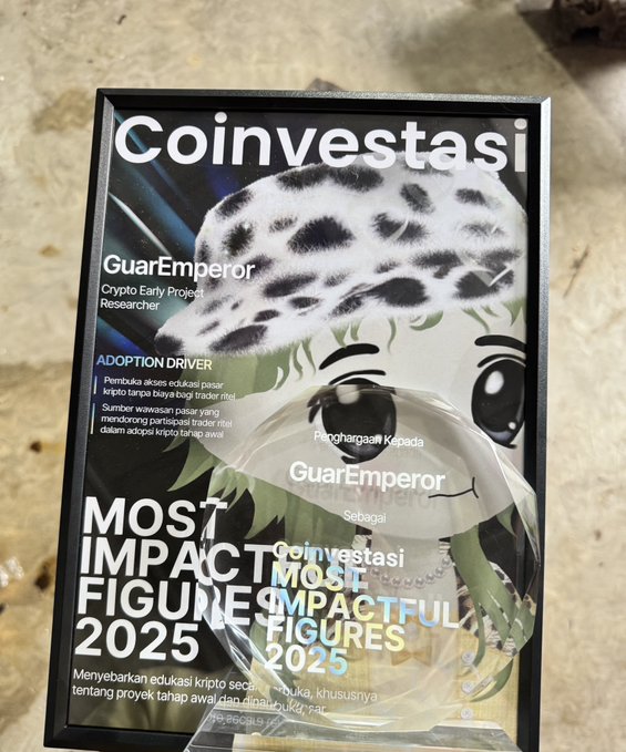 A framed award from Coinvestasi proudly displays "MOST IMPACTFUL FIGURES 2025" honoring "GuarEmperor, Crypto Early Project Researcher" for driving crypto adoption and education in the Indonesian market, with the recipient posing behind the plaque at Coinfest Asia.