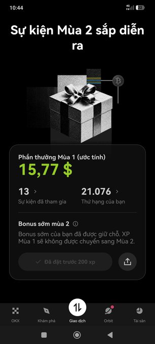 A mobile app screen showing an upcoming "Sự kiện Mùa 2 sắp diễn ra" (Season 2 event coming soon) with a 15.77$ estimated reward and 21,076 XP.