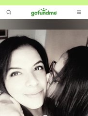 The image shows two women taking a close selfie, with one woman kissing the other's cheek, posted alongside a GoFundMe screenshot. The accompanying post promotes an NFT collection called "Ecstacy" from objkt.com, with proceeds going toward a charitable fundraiser at the wallet address tz1YbhP36ABXEJjFmUmwnsCXp2mKfzAiMFGu—likely reflecting the personal, heartfelt nature of the fundraising campaign.