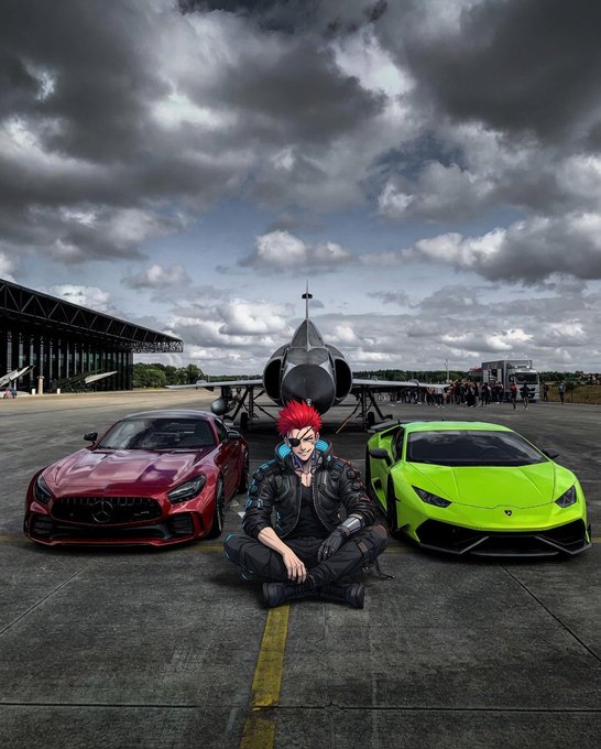 A red-haired anime-style character wearing headphones sits cross-legged between a red Mercedes-AMG and a lime-green Lamborghini on an airfield tarmac, with a fighter jet and cloudy sky in the background. The caption evokes the post's themes of sovereign AI and futuristic technology, presenting the character as a confident "builder" amid symbols of high performance, while the image itself contains no visible text or branding related to ARC, ANIMA, or OnchainAI.