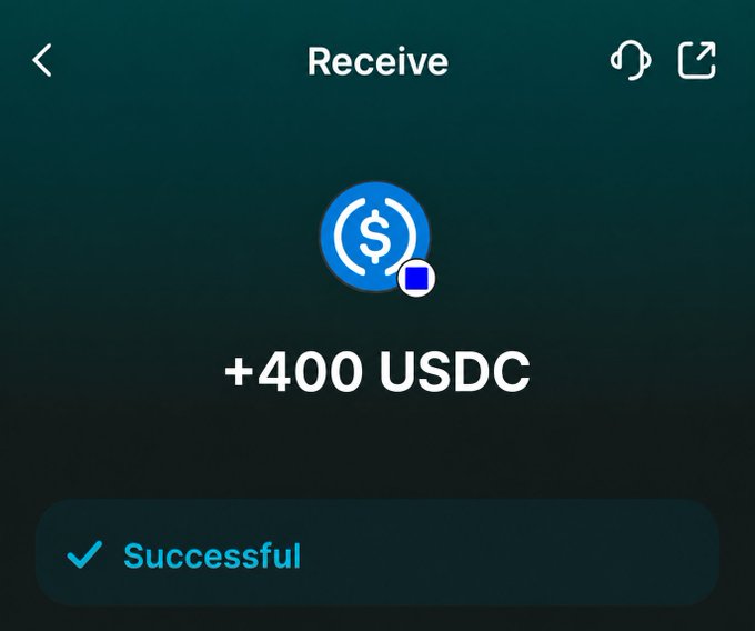A dark-themed cryptocurrency wallet interface showing a successful receive transaction of '+400 USDC' with a USDC token icon.