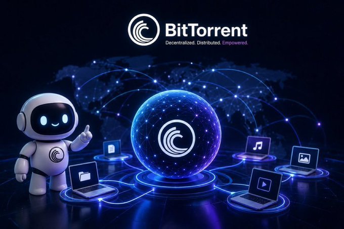 A promotional image for BitTorrent with the tagline "Decentralized. Distributed. Empowered.," featuring a cute white robot character and a glowing blue globe surrounded by connected laptops displaying media icons.