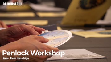 A close-up of hands holding a pen and paper at a workshop, with text reading 'ORIGINSEOUL' and 'Penlock Workshop' with 'Venue: Bitcoin House Origin' at the bottom.