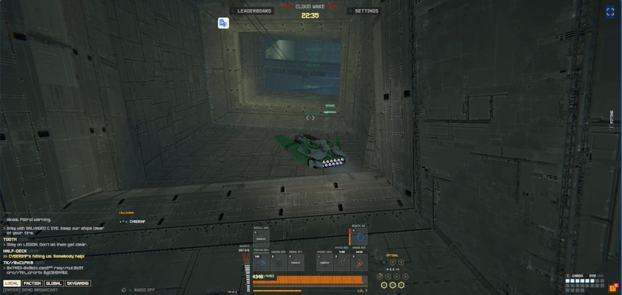 A screenshot of a tank video game showing a green tank in an industrial corridor, with a UI displaying 'CLOUD WAVE', '22:35', a timer, weapons loadout, and chat text mentioning 'TEETH', 'HALF-DECK', and 'X4 BUFFGATE'.