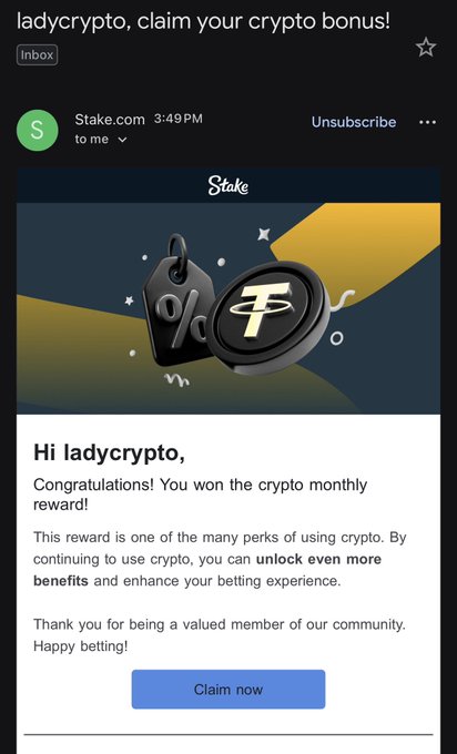 Spam email from Stake.com addressed to "ladycrypto" claiming they won a crypto monthly reward, with a "Claim now" button.