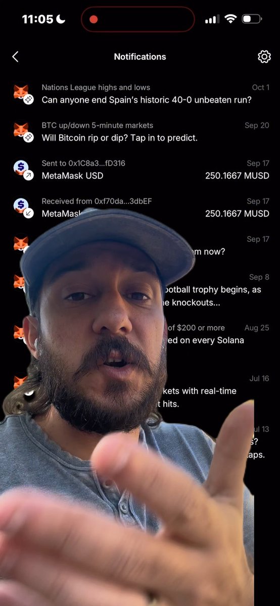 A man with a beard and a cap appears in front of a smartphone screen showing a notifications list with MetaMask USD transactions and various app alerts.