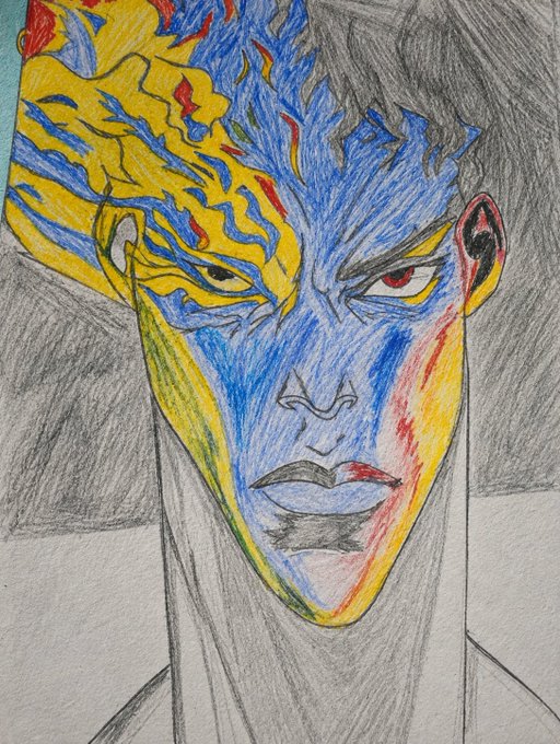 A colored pencil and graphite drawing depicts a stylized male face with split coloring—one side featuring blue and yellow flame patterns with a red eye, and the other side rendered in grayscale.