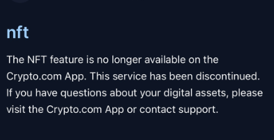 The image displays a Crypto.com App notification in white text on a dark background, reading: "nft - The NFT feature is no longer available on the Crypto.com App. This service has been discontinued." This visual confirms the post's claim about the erosion of Crypto.com's NFT section, showing the platform's official discontinuation message following layoffs of its NFT department staff.