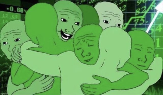 A group of green "Wojak" meme characters are shown tightly hugging each other in front of a stock chart with green percentages (+0.68%) and numbers (12.08, 16, 82%, 75, 54, etc.) in the background.

The image ties to "Chat, we're so so back" by humorously conveying a sense of reunion and excitement over a stock market recovery, with the Wojaks' joyful group hug reflecting collective relief and celebration at seeing green (positive) numbers return.