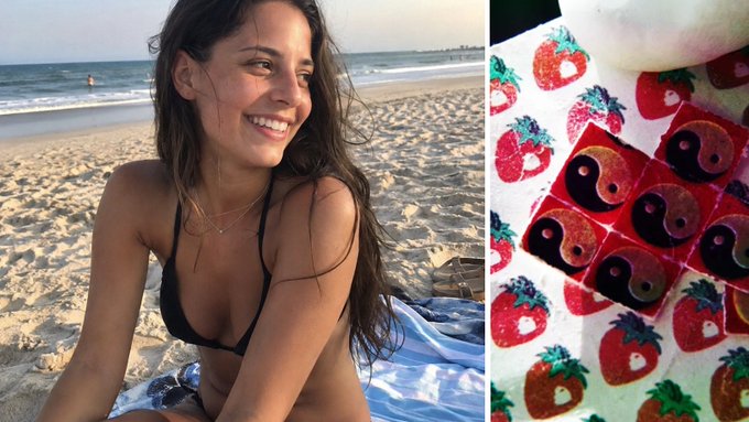 A smiling woman in a black bikini sits on a beach, paired with an image of strawberry-patterned gummy candies, accompanying a post about a woman who gained a sense of smell for the first time during an LSD trip.