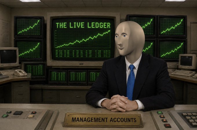 A masked figure in a suit sits at a 'MANAGEMENT ACCOUNTS' desk in front of monitors displaying 'THE LIVE LEDGER' and rising stock charts in green.