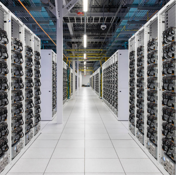 A pristine AI data center with rows of high-density server racks arranged symmetrically down a brightly lit corridor. The image visually reinforces the post's claim of Bitcoin miners pivoting to AI infrastructure, which now yields 25x more revenue per kilowatt-hour—particularly in Texas, where 73% of miners are reportedly converting facilities.