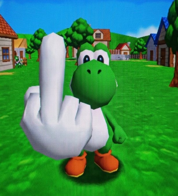 A 3D animated green dinosaur-like character with a large white gloved hand pointing upward, standing on grass with houses in the background.