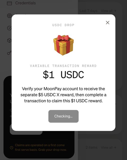 A MoonPay popup showing a 'USDC DROP' with a gift box icon, offering a '$1 USDC' variable transaction reward requiring MoonPay account verification and a transaction to claim, with a 'Checking...' button.