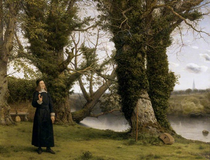 A classical landscape painting depicting a man in dark robes standing in a lush forest setting near a lake, with a distant church spire visible on the horizon.