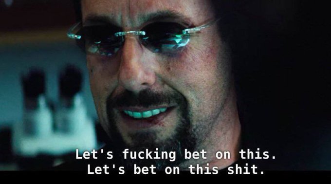 A close-up of a man wearing sunglasses smirking, with subtitles reading "Let's fucking bet on this. Let's bet on this shit." — humorously paired with a PolyMarket prediction asking whether Clavicular and Alexandria Ocasio-Cortez will confirm a relationship in 2026.