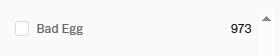 A small UI snippet displays a checkbox next to the text 'Bad Egg' with the number '973' and a small upward triangle on the right.