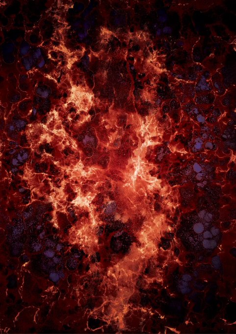 An abstract image resembling molten lava or burning embers, featuring bright orange-red flames against dark patches with blue-purple accents.