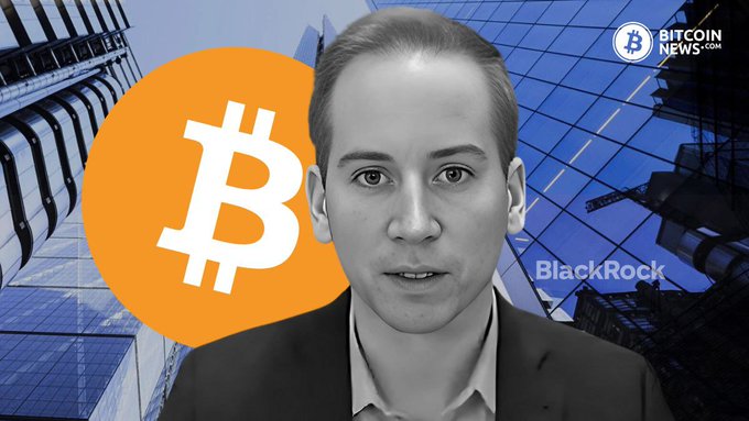 A black-and-white portrait of a man (likely Robbie Mitchnick) is featured alongside a large orange Bitcoin logo and "BlackRock" text, with a "Bitcoin News" watermark in the corner, illustrating the story about BlackRock lowering its in-kind Bitcoin-to-IBIT exchange minimum to $1 million.