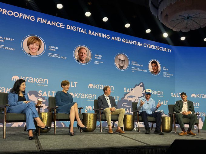 A panel discussion at the Salt Lake City conference with five people seated on stage; the backdrop reads 'PROOFING FINANCE: DIGITAL BANKING AND QUANTUM CYBERSECURITY' and features speakers including Caitlin Long (Custodia Bank), Jeffery Wallet (Y11Z), Michal Pompernalski (Americaneconometric Inc.), and Nic Carter (Castle Island Ventures).