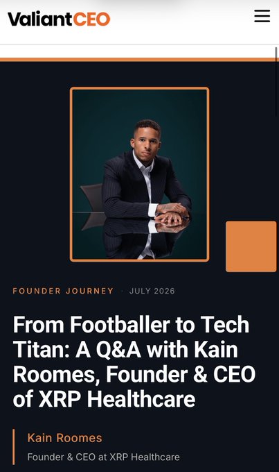 The image shows a ValiantCEO article featuring Kain Roomes, Founder & CEO of XRP Healthcare, titled "From Footballer to Tech Titan: A Q&A with Kain Roomes, Founder & CEO of XRP Healthcare," published in the Founder Journey section dated July 2026. The visual pairs a professional portrait of Roomes in a dark suit with the article's branding, complementing the post's focus on his unconventional journey from football to leading an AI-driven healthcare company.