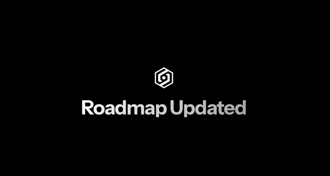 The image displays the text "Roadmap Updated" centered below a hexagonal logo on a black background. This graphic serves as an announcement header for the accompanying post, which details the realignment of project timelines, including the public-sale shift from Q3 to Q4 alongside mainnet and TGE milestones.