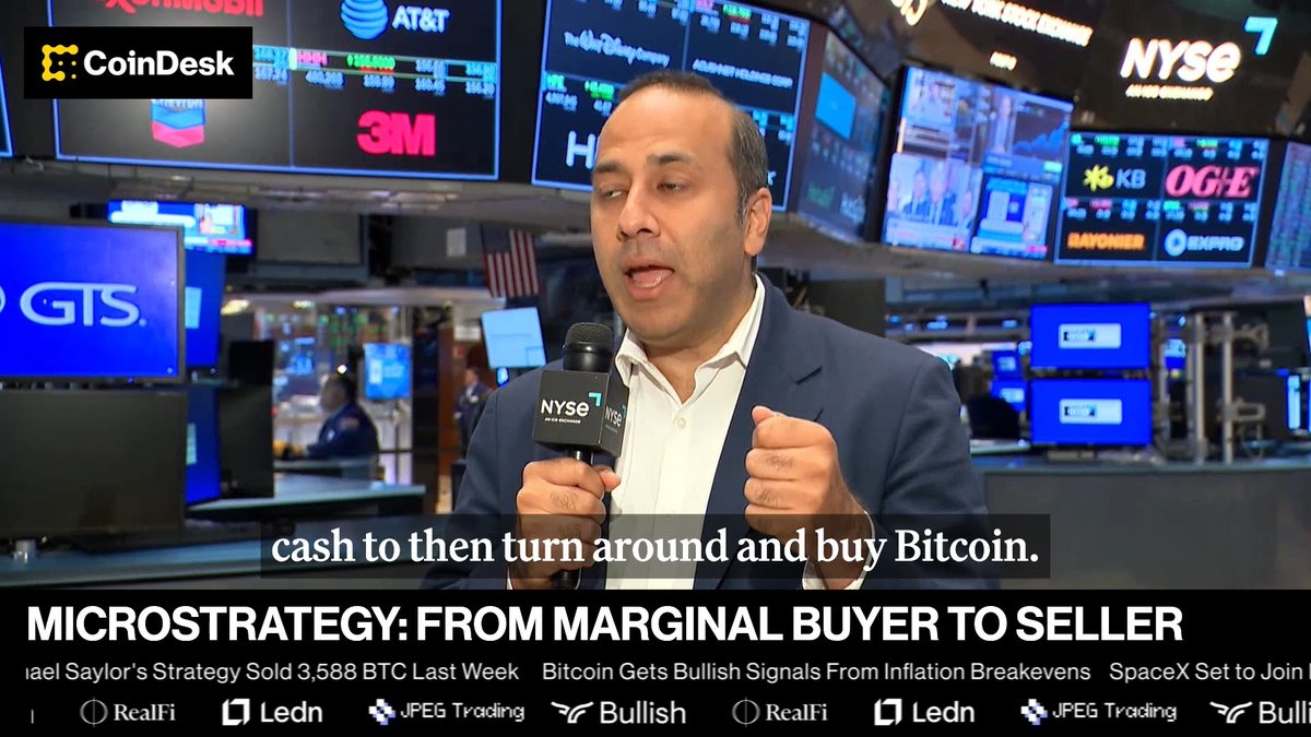 Ram Ahluwalia, CEO of Lumida Wealth, is interviewed on the NYSE floor holding an "NYSE" microphone, with a headline below reading "MICROSTRATEGY: FROM MARGINAL BUYER TO SELLER" noting that Michael Saylor's Strategy sold 3,588 BTC last week, while visible screen tickers include AT&T, 3M, KB, OGE, and BAYONER. The image aligns with the post by visually presenting Ahluwalia's critique of Strategy's shift from accumulating Bitcoin to selling it.
